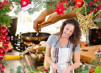 Una donna che cucina felice a Natale